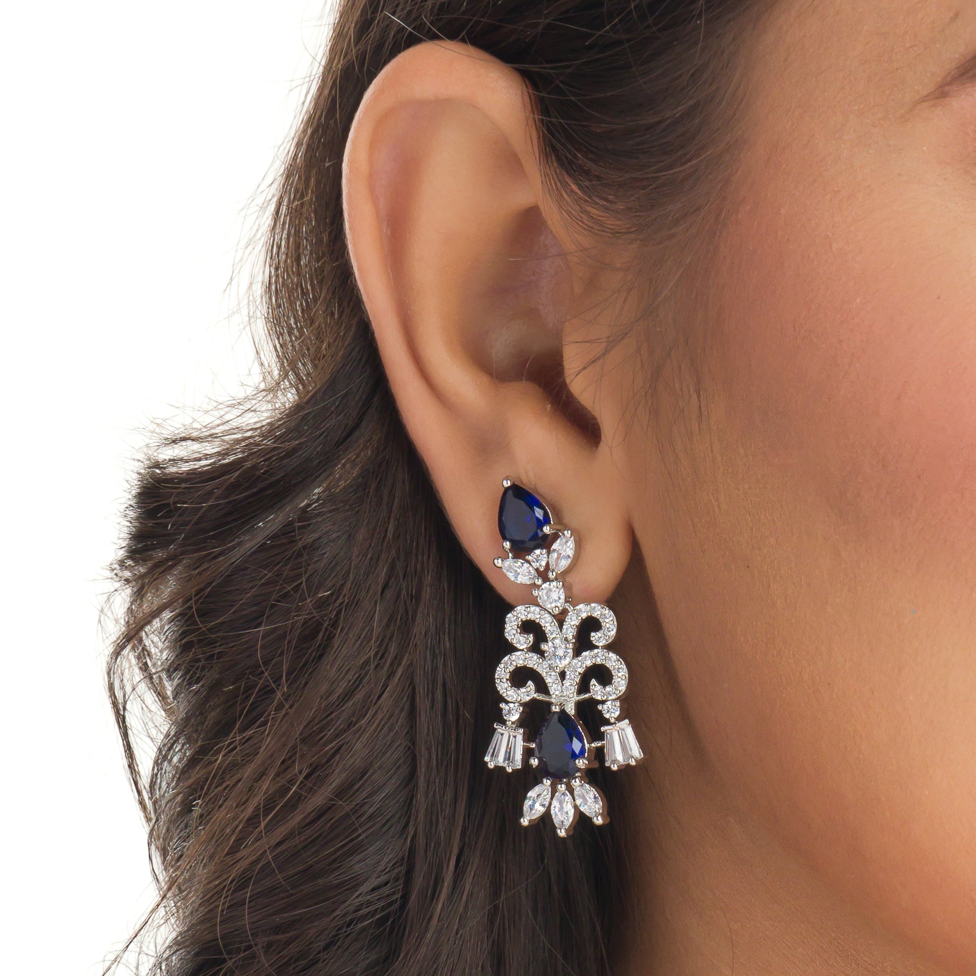 "Navy blue zircon necklace offers a sophisticated splash of color and sparkle."

