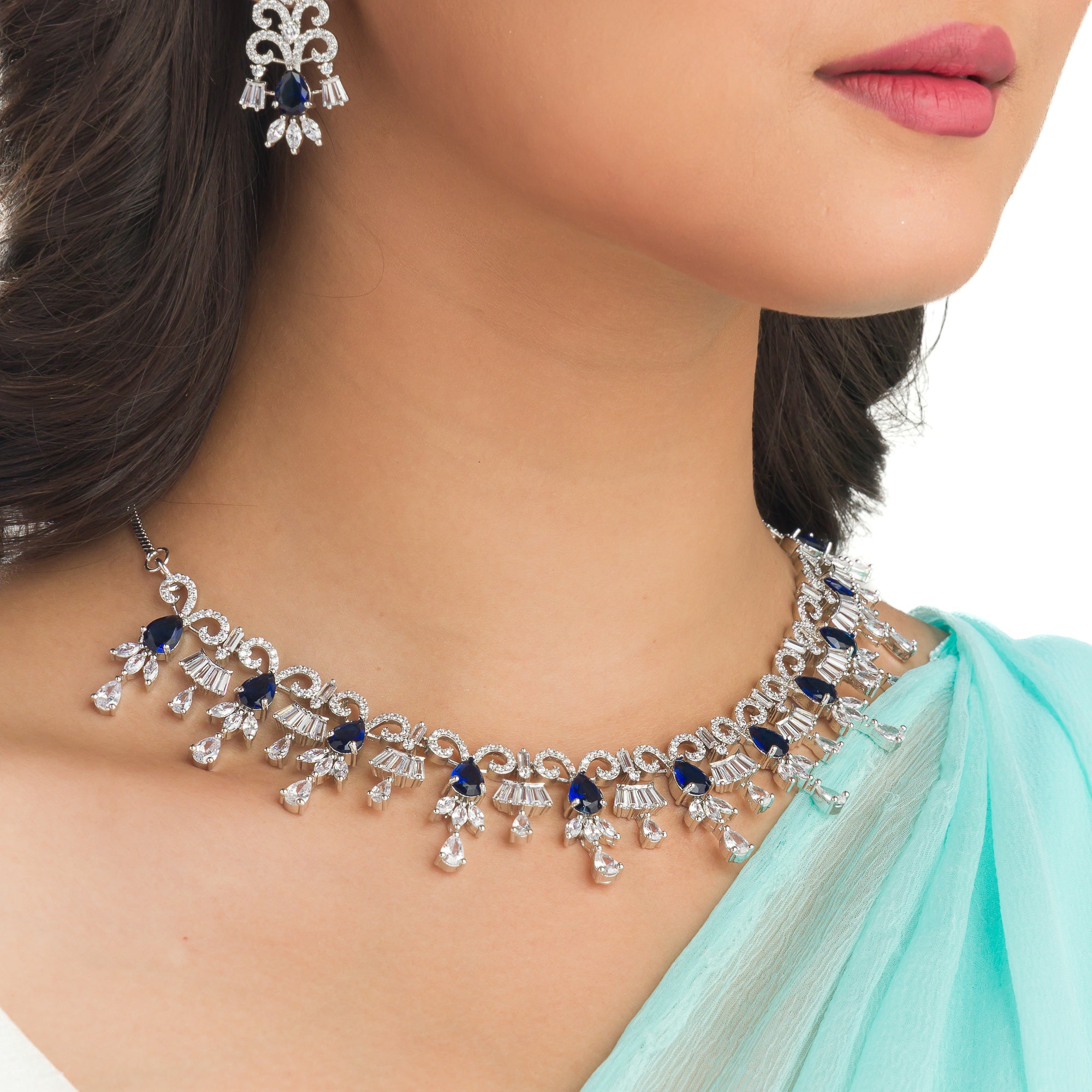 "Navy blue zircon necklace offers a sophisticated splash of color and sparkle."
