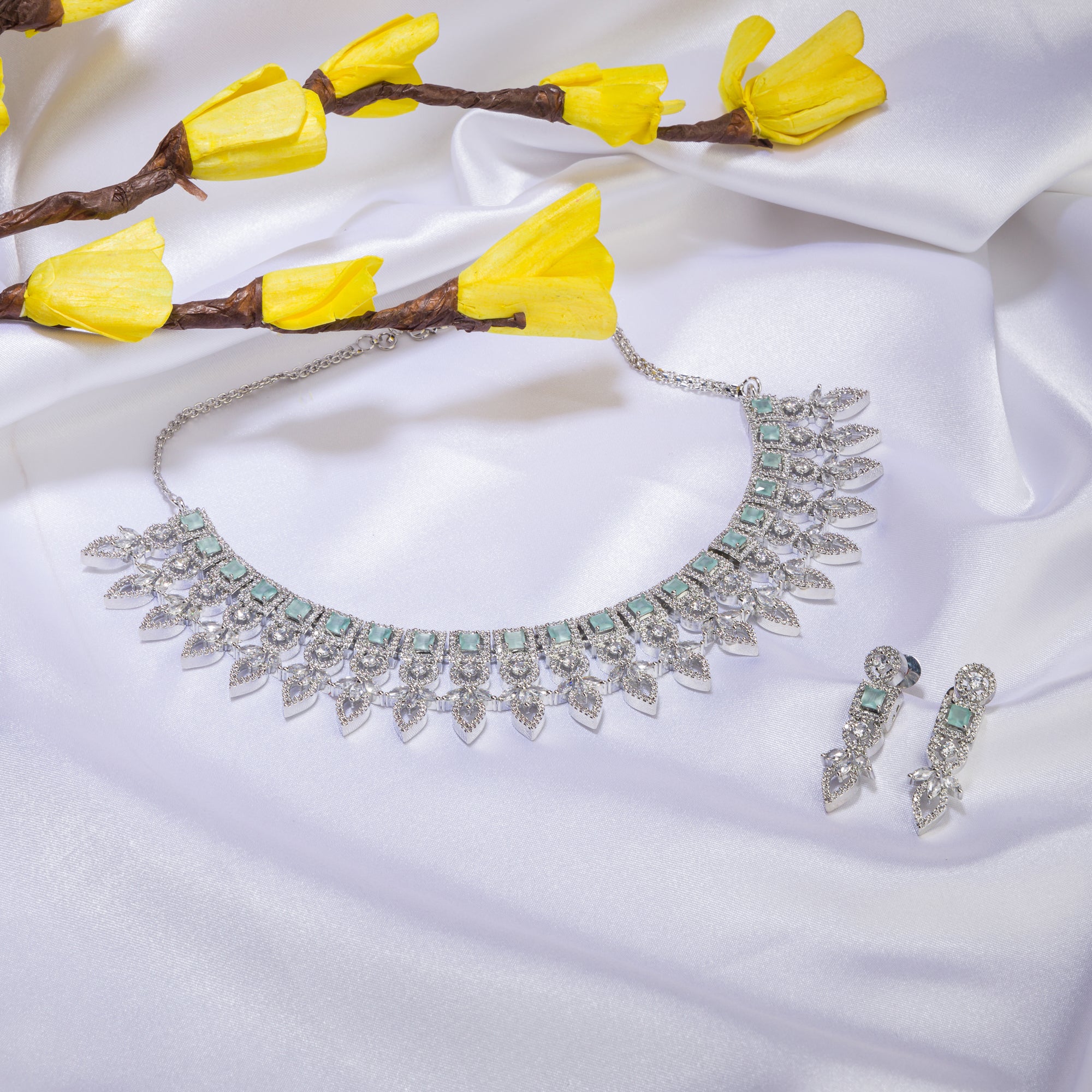 "Light green zircon necklace adds a fresh, subtle touch of elegance."
