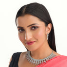 "Light green zircon necklace adds a fresh, subtle touch of elegance."
