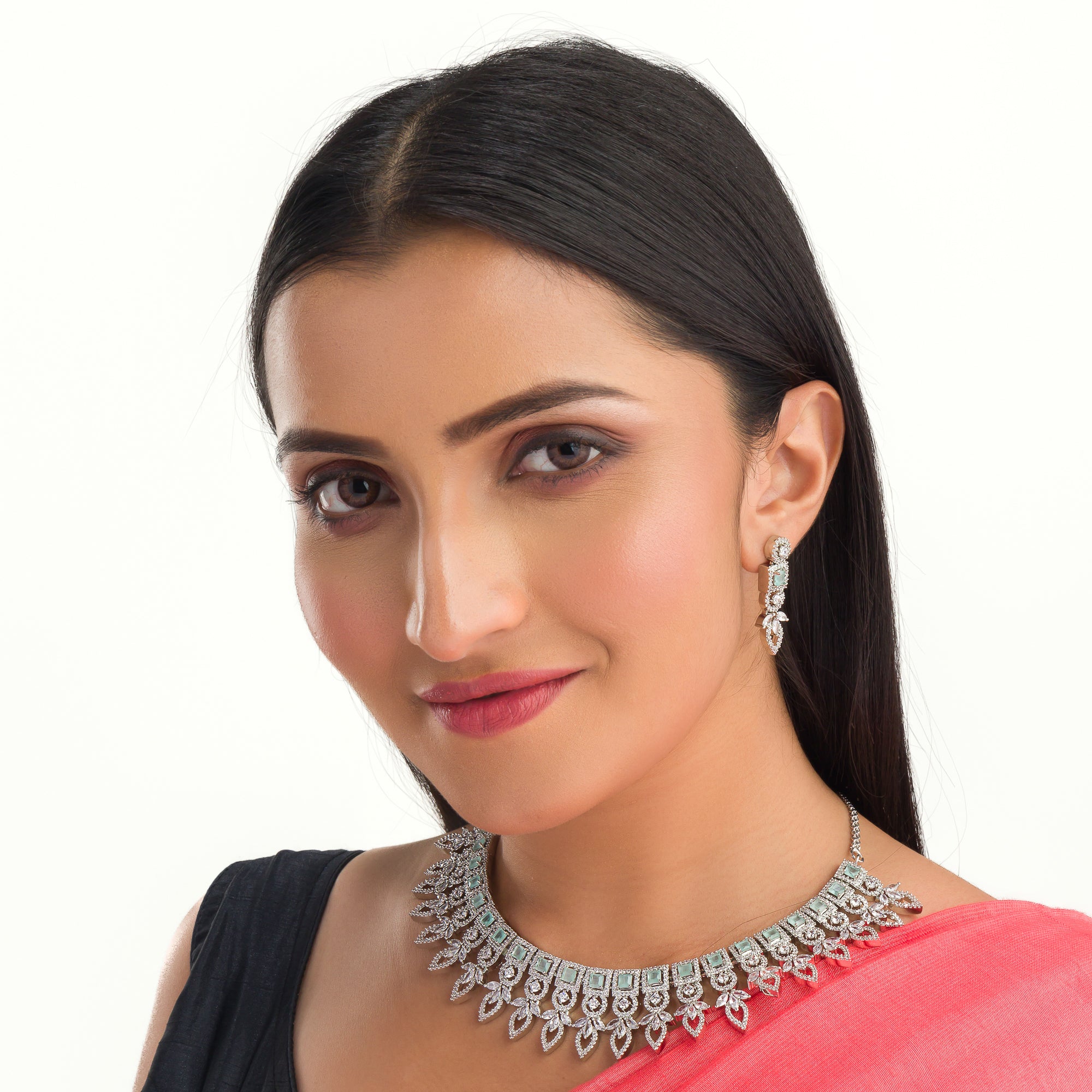 "Light green zircon necklace adds a fresh, subtle touch of elegance."
