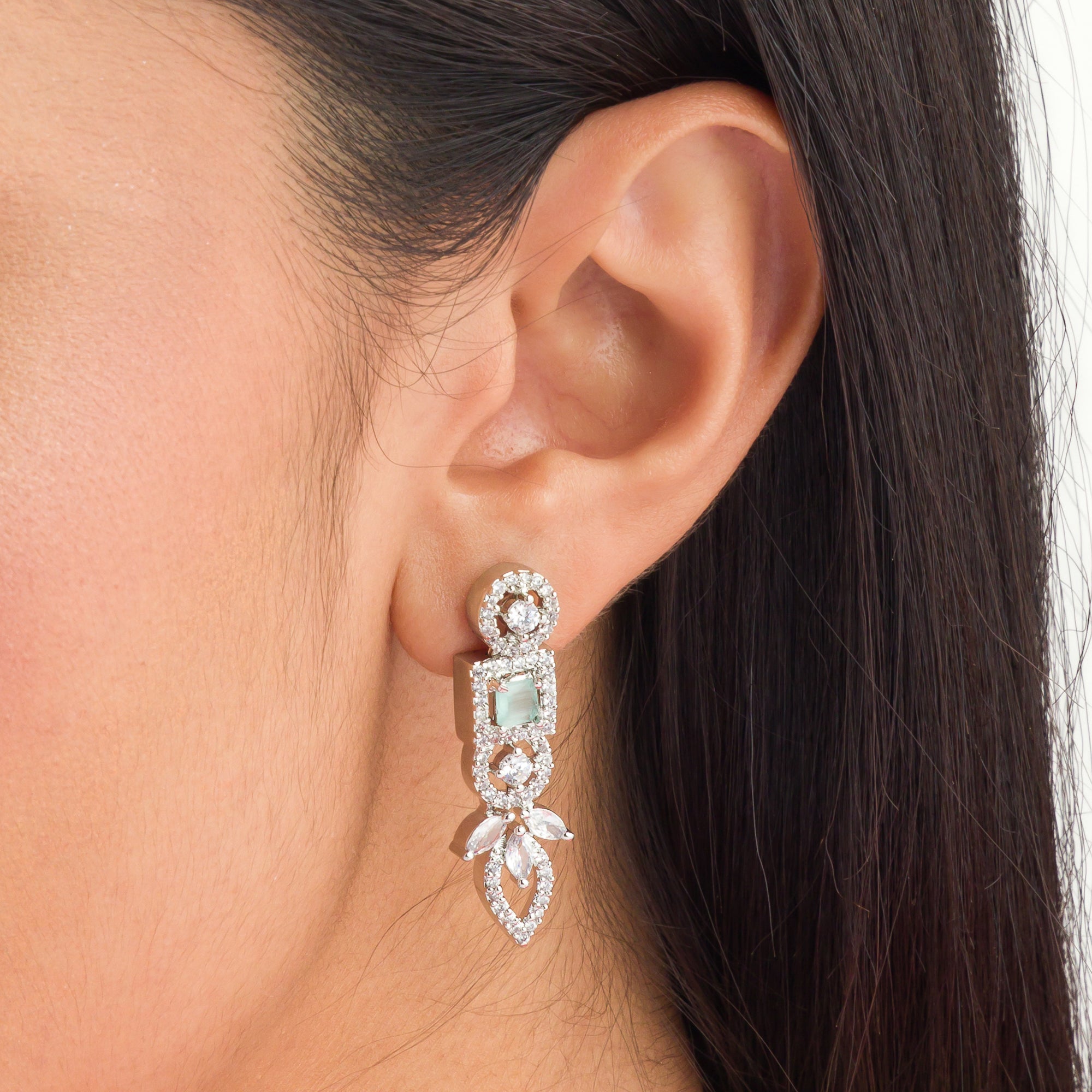 "Light green zircon necklace adds a fresh, subtle touch of elegance."
