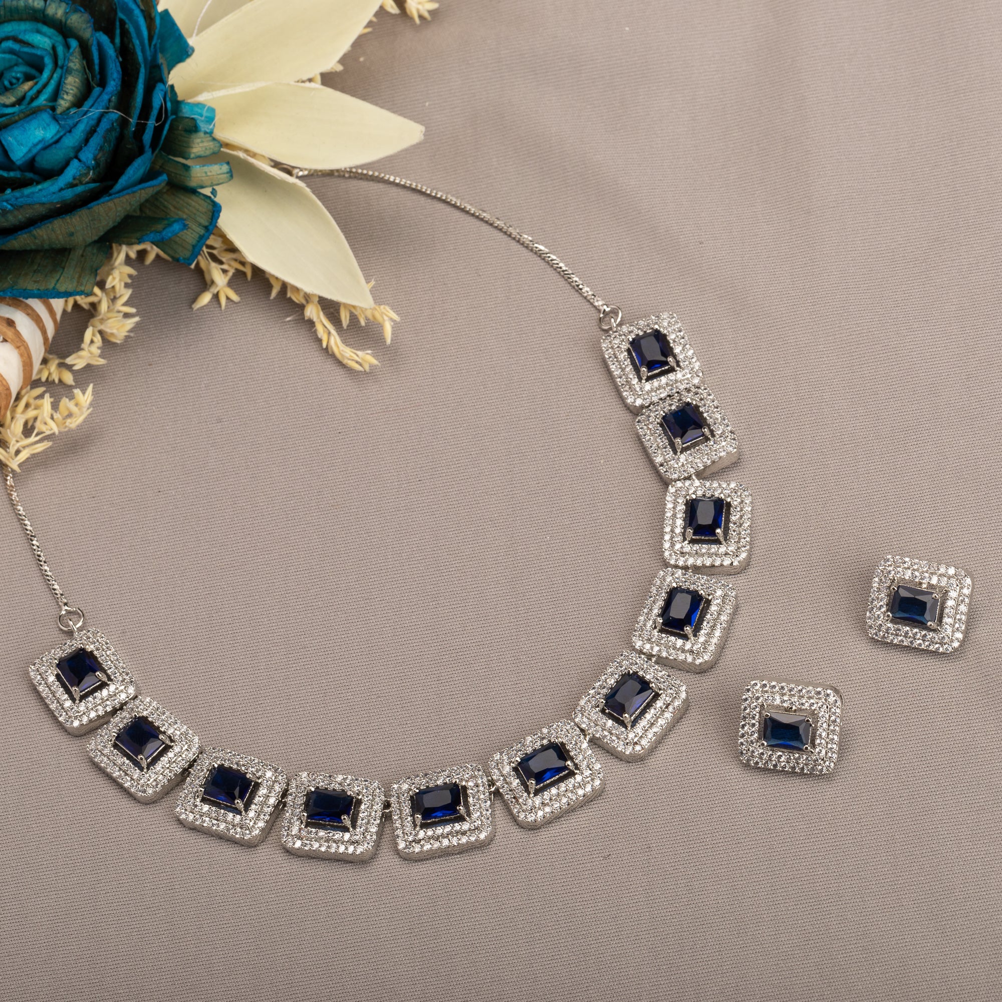 "Navy blue square zircon short necklace offers vibrant, chic elegance."
