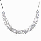 "Zircon necklace with infinity design symbolizes timeless elegance."
