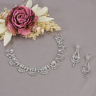 "Zircon necklace with infinity design symbolizes timeless elegance."
