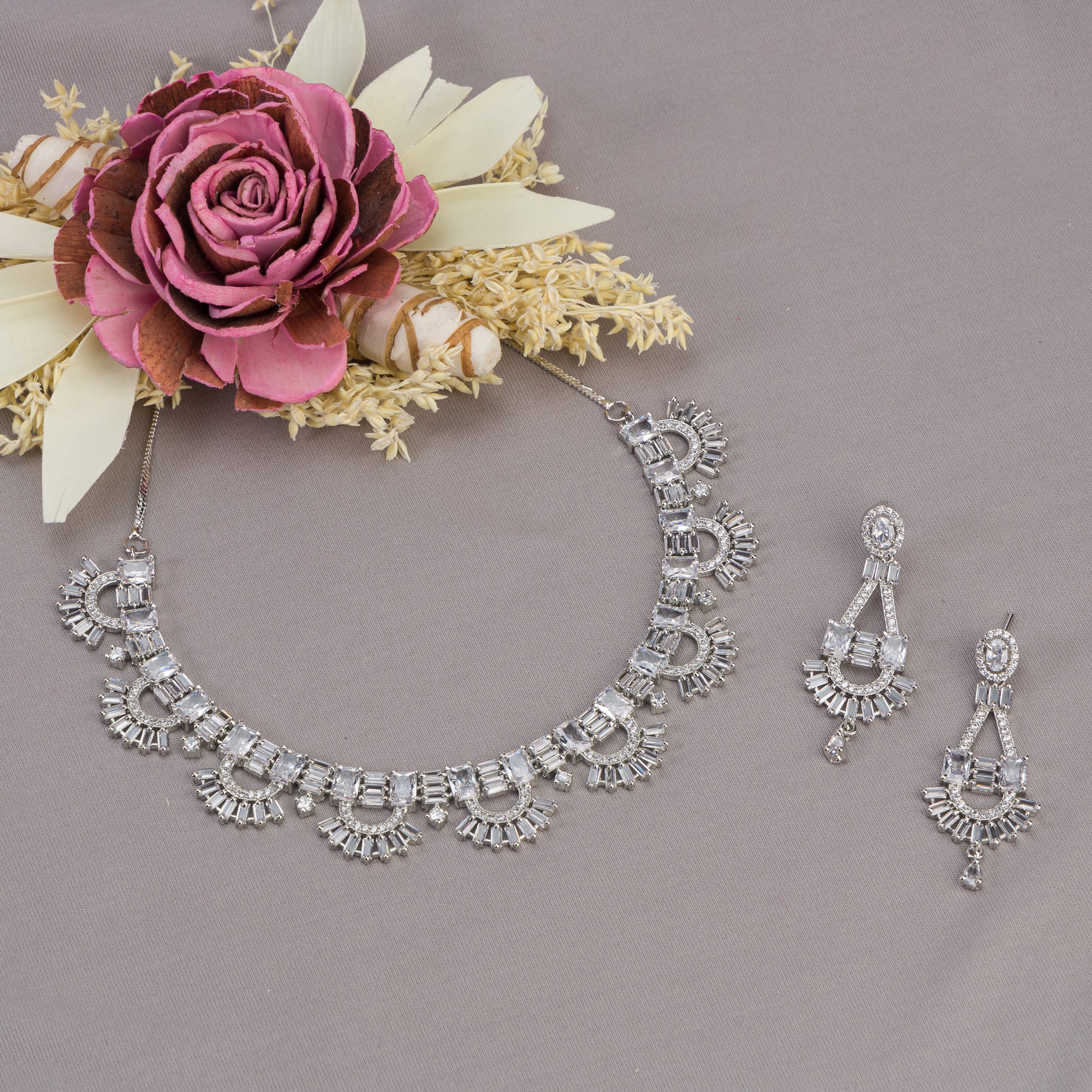 "Zircon necklace with infinity design symbolizes timeless elegance."
