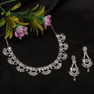 "Zircon necklace with infinity design symbolizes timeless elegance."
