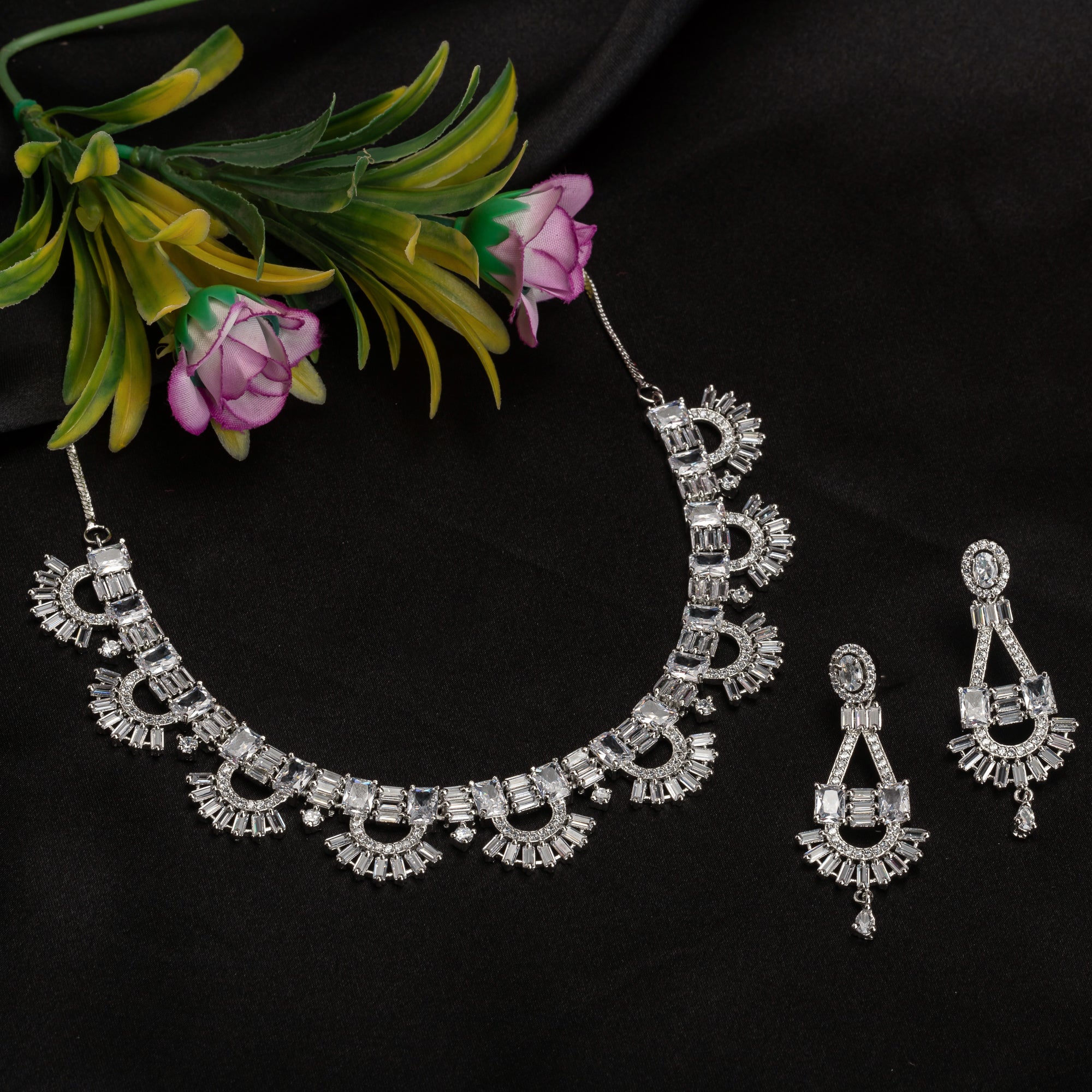 "Zircon necklace with infinity design symbolizes timeless elegance."

