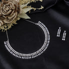 "White zircon necklace offers timeless elegance with sparkling clarity."
