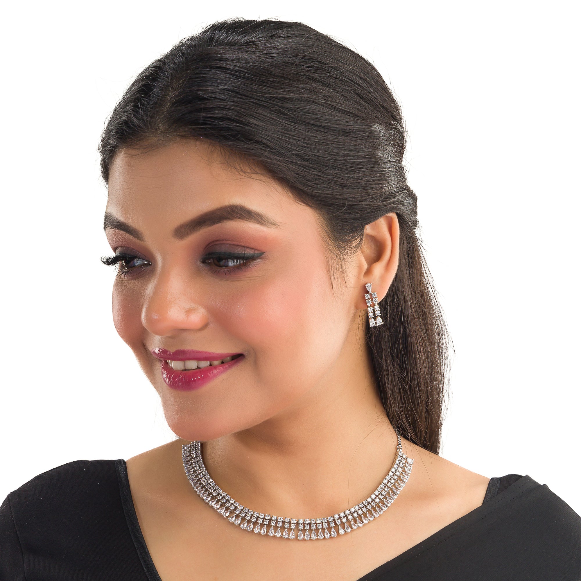 "White zircon necklace offers timeless elegance with sparkling clarity."
