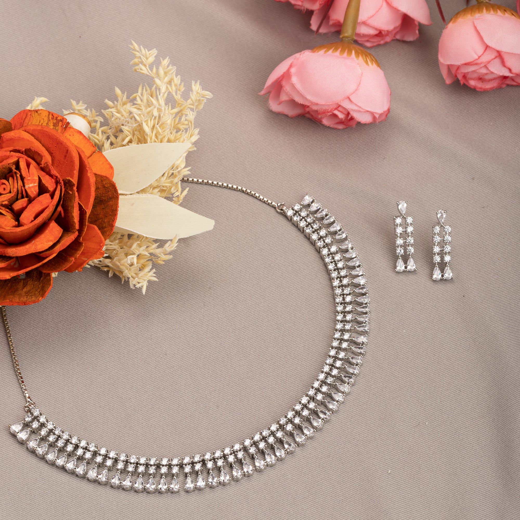 "White zircon necklace offers timeless elegance with sparkling clarity."
