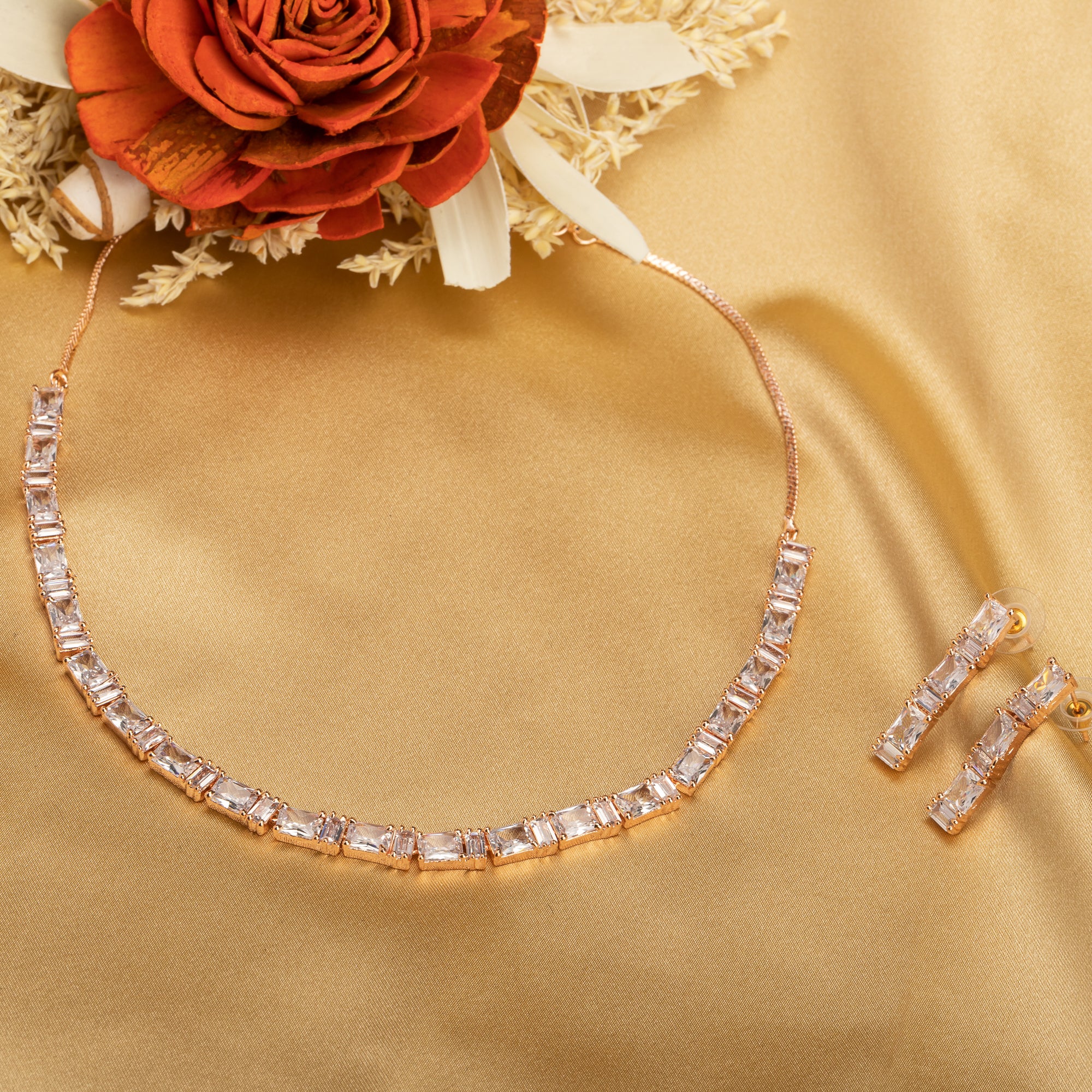 "Rose gold zircon necklace radiates timeless elegance with a warm shine."
