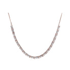 "Rose gold zircon necklace radiates timeless elegance with a warm shine."
