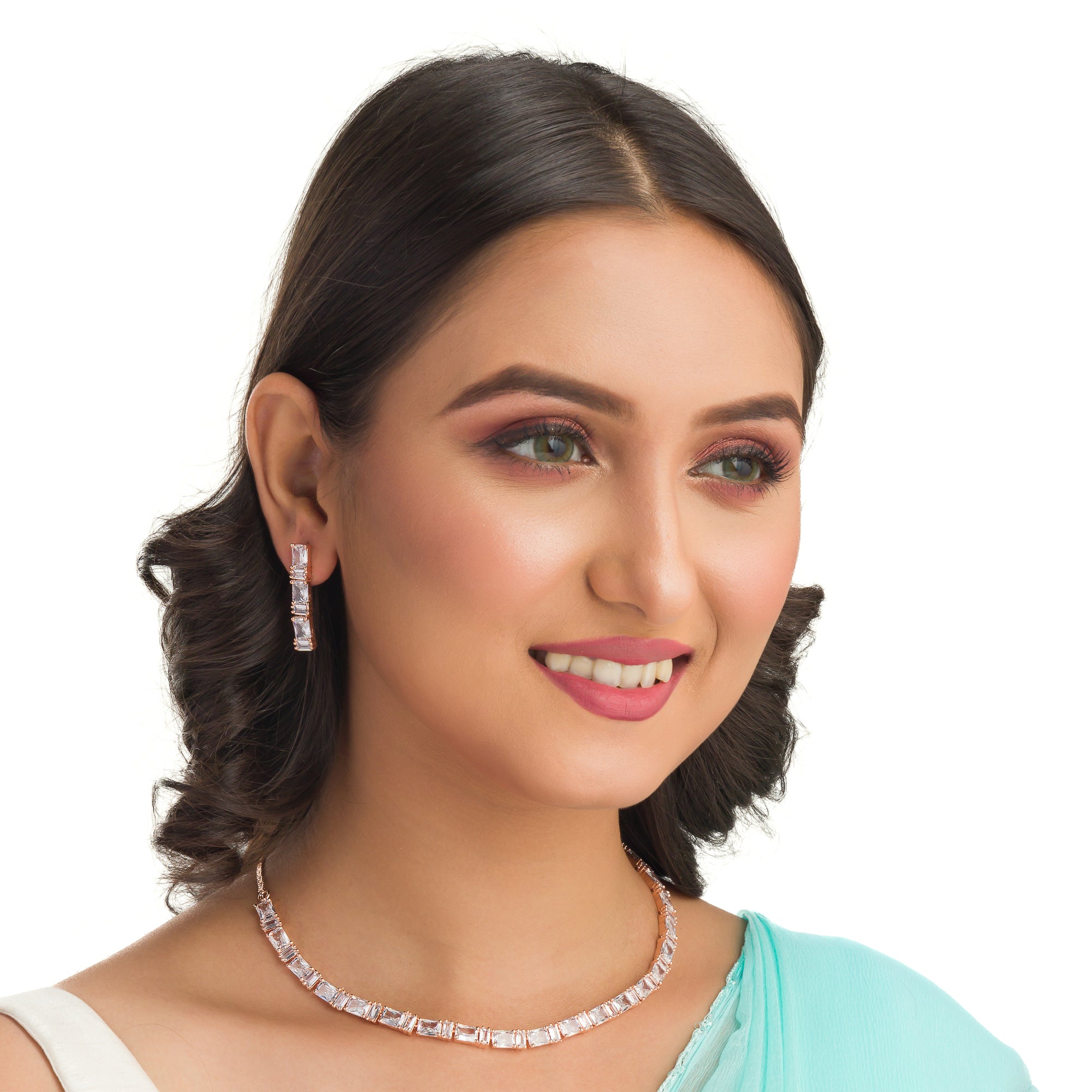"Rose gold zircon necklace radiates timeless elegance with a warm shine."
