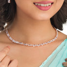 "Rose gold zircon necklace radiates timeless elegance with a warm shine."
