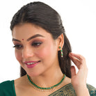 "Elegant green zircon necklace offers a vibrant splash of color and brilliance."
