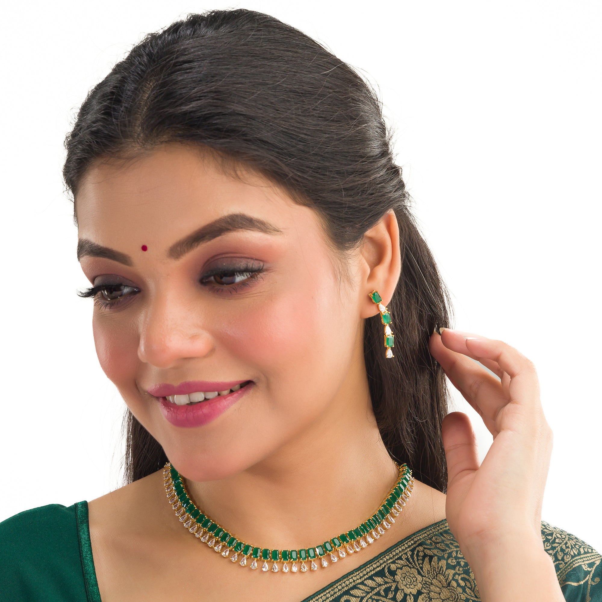 "Elegant green zircon necklace offers a vibrant splash of color and brilliance."
