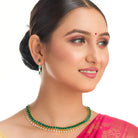 "Elegant green zircon necklace offers a vibrant splash of color and brilliance."
