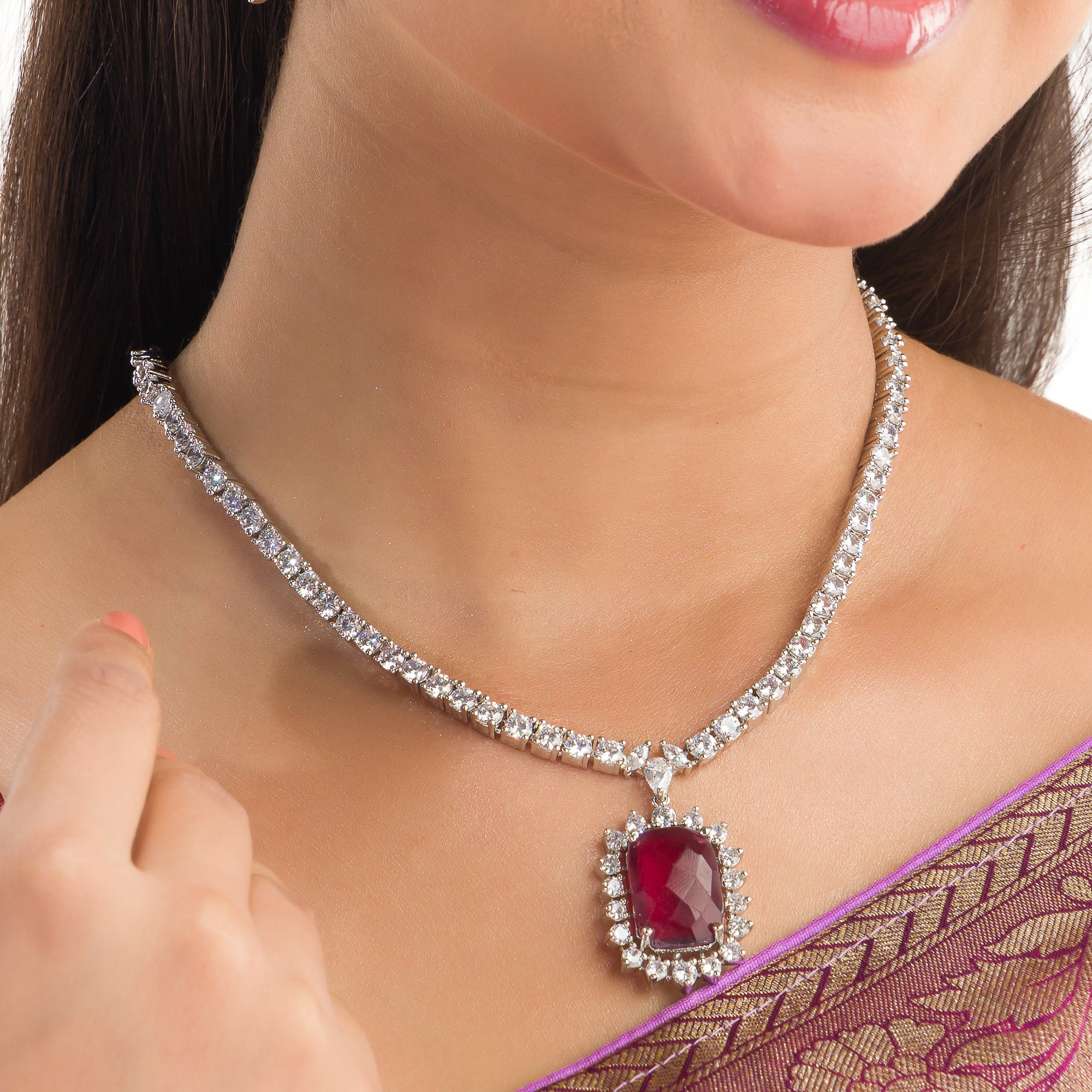 "Rich maroon zircon pendant necklace adds sophistication and elegance."
