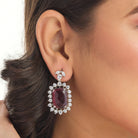 "Rich maroon zircon pendant necklace adds sophistication and elegance."
