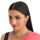 "Square and floral zircon necklace in rose gold blends geometric and floral elegance."
