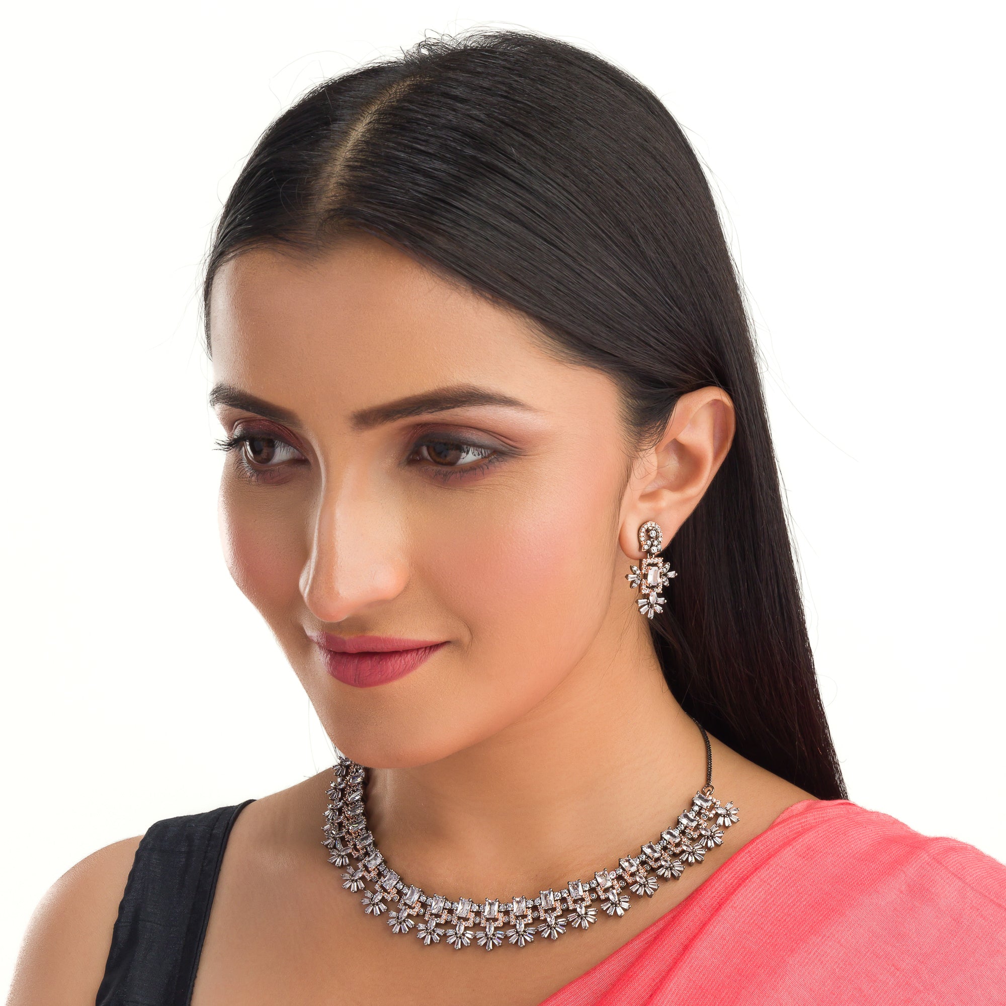 "Square and floral zircon necklace in rose gold blends geometric and floral elegance."
