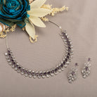 "Navy blue zircon necklace in rose gold offers deep, elegant allure and sophistication."
