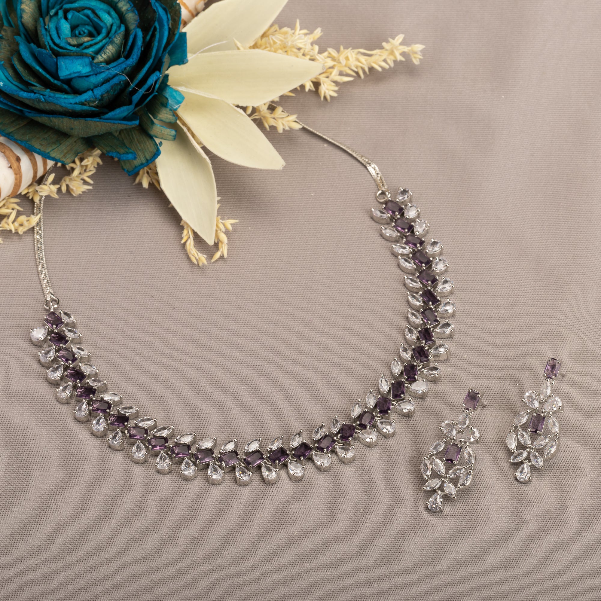 "Navy blue zircon necklace in rose gold offers deep, elegant allure and sophistication."
