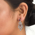 "Navy blue zircon necklace in rose gold offers deep, elegant allure and sophistication."
