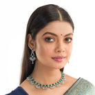 "Green and white zircon necklace in silver delivers a refined, striking elegance."
