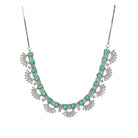 "Green and white zircon necklace in silver delivers a refined, striking elegance."
