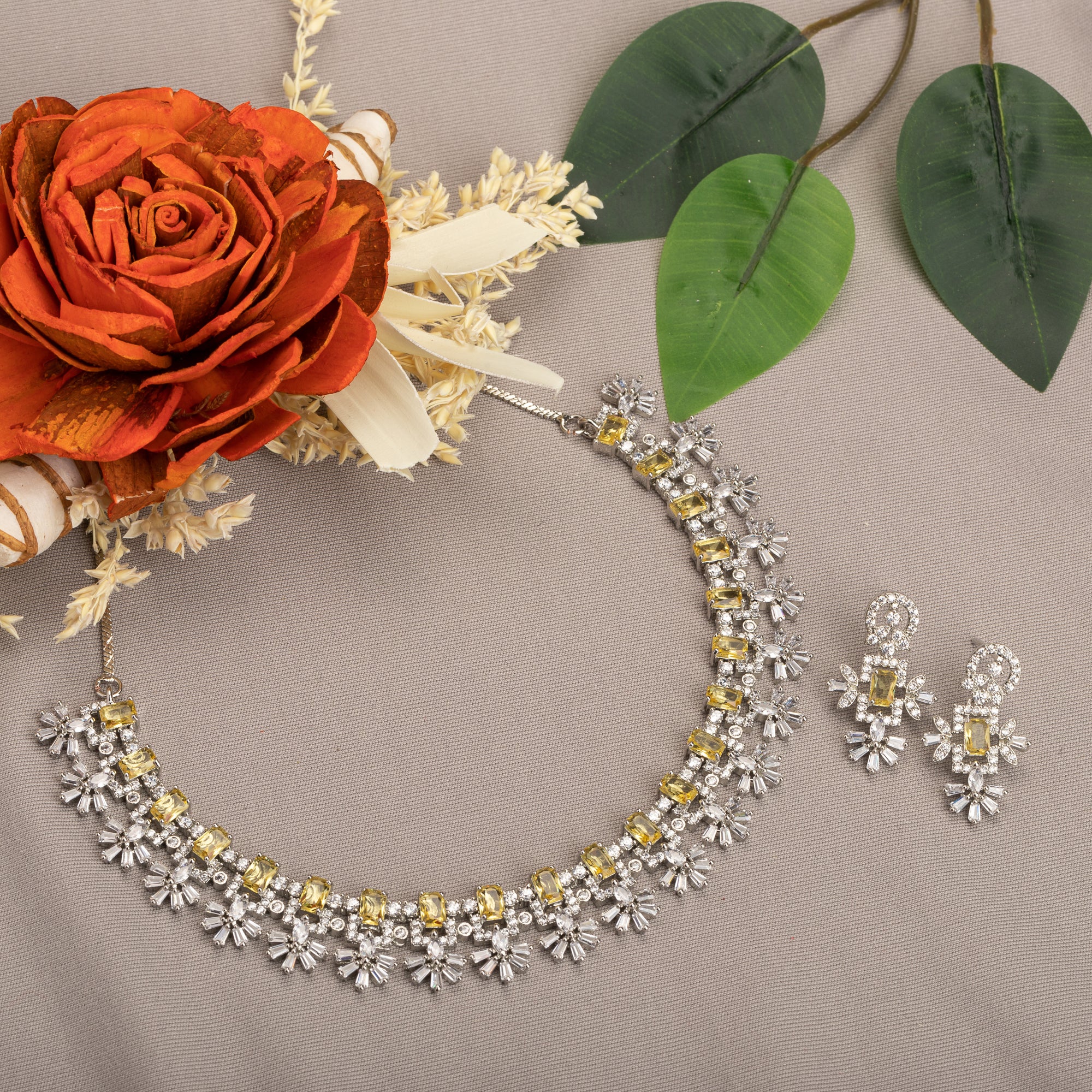 Rose gold necklace with yellow zircon brings radiant charm and warmth to your look.
