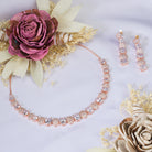 "Rose gold necklace with zircon round stones offers refined elegance and timeless appeal.
