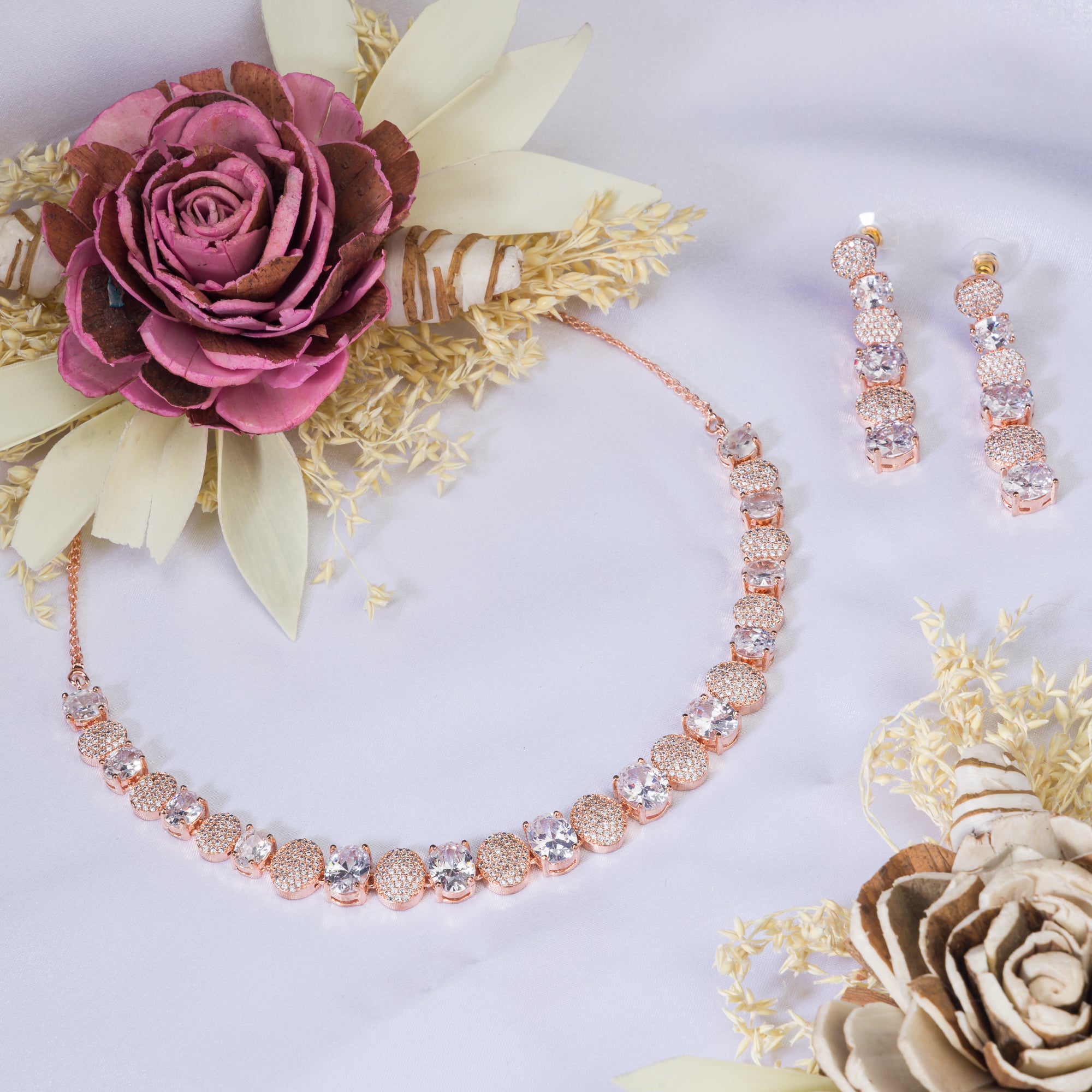 "Rose gold necklace with zircon round stones offers refined elegance and timeless appeal.
