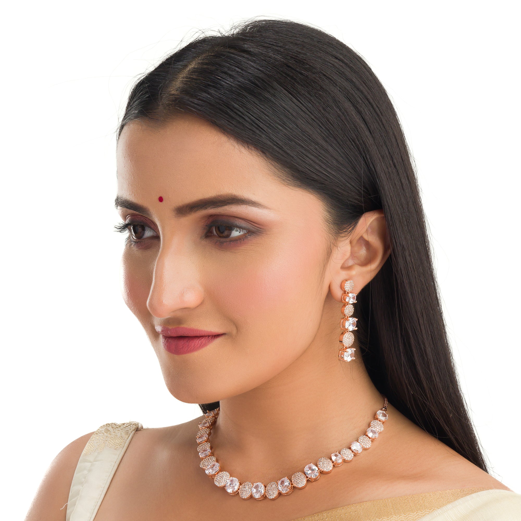 "Rose gold necklace with zircon round stones offers refined elegance and timeless appeal.
