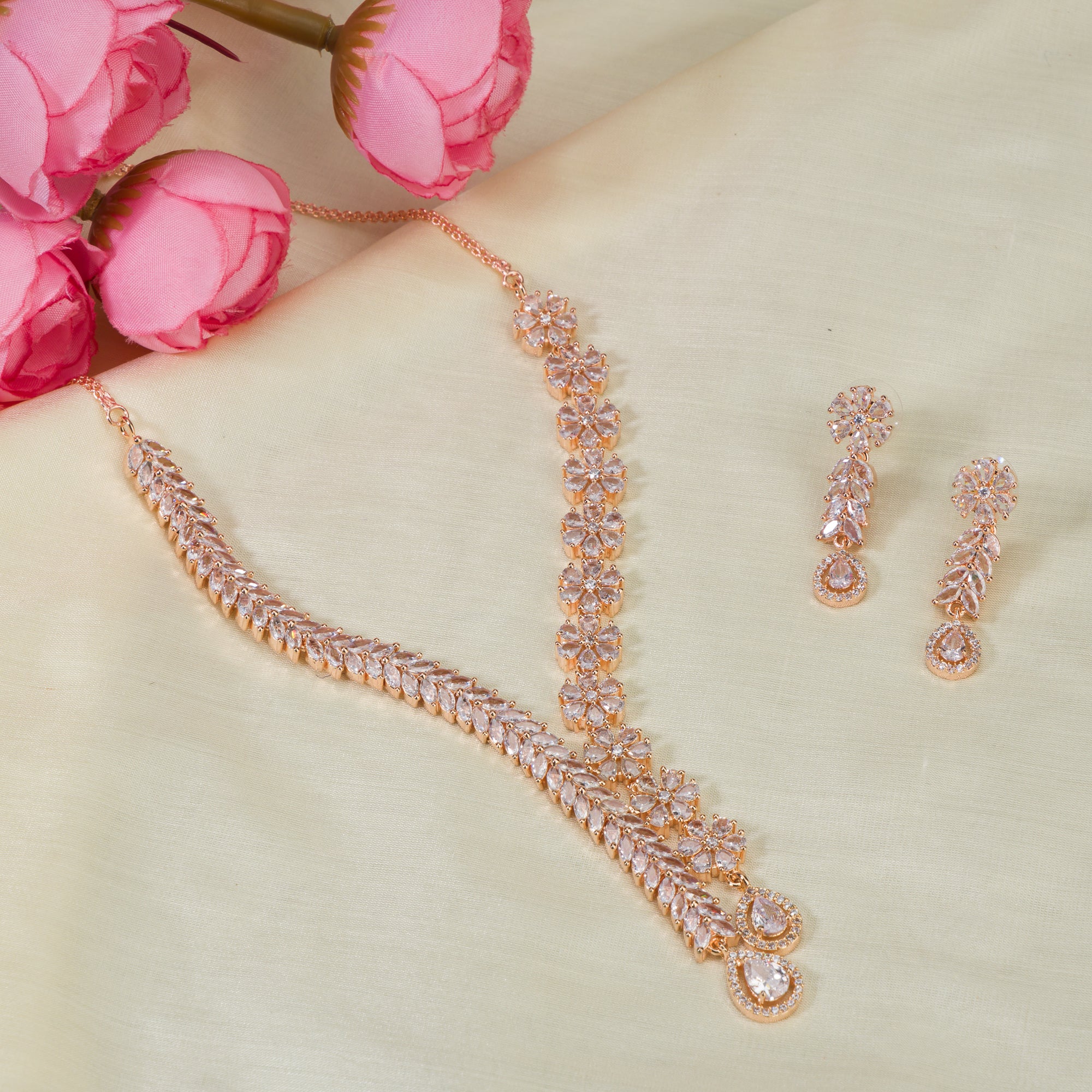 "Flower and leaf design zircon necklace in rose gold offers chic elegance and timeless style."
