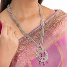 "Zircon necklace with leaf motifs exudes natural elegance and timeless beauty."
