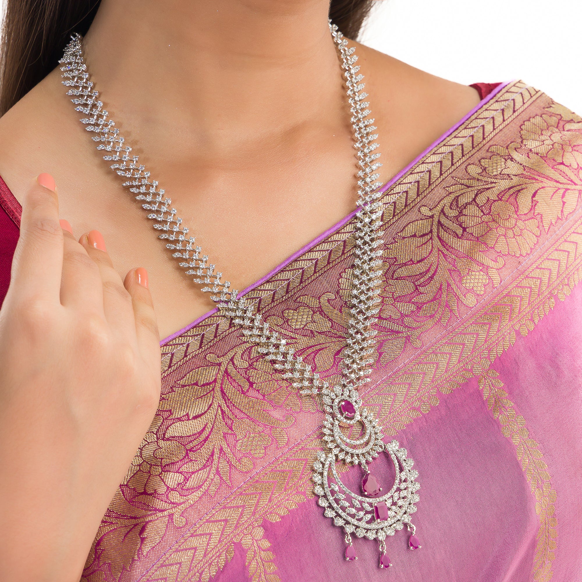 "Zircon necklace with leaf motifs exudes natural elegance and timeless beauty."
