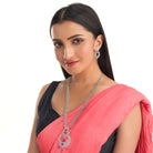 "Zircon necklace with leaf motifs exudes natural elegance and timeless beauty."
