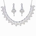 "Silver zircon necklace with leaf motifs adds natural elegance and sophisticated charm."
