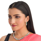 "Trendy pink and green zircon necklace in square design offers chic, modern elegance."
