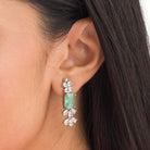 "Trendy pink and green zircon necklace in square design offers chic, modern elegance."
