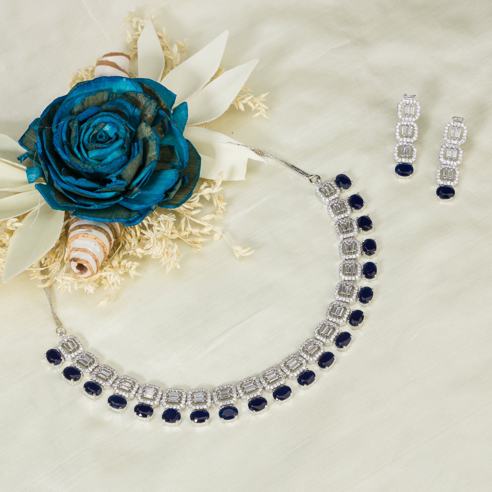 "Dark blue zircon square necklace adds bold sophistication and deep color."
