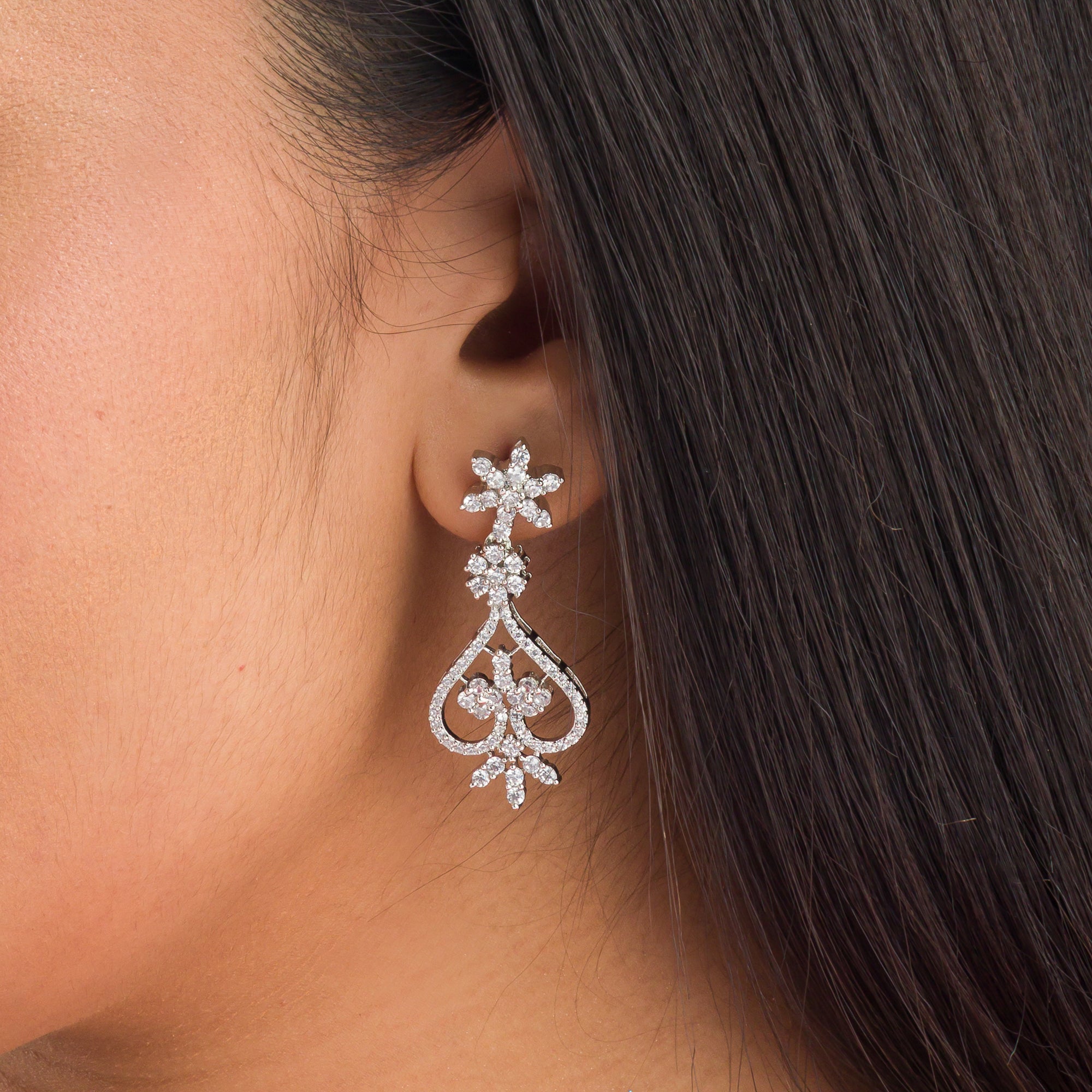 "Zircon necklace sparkles with dazzling brilliance for timeless elegance."
