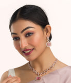 "Pink square and white zircon necklace with rose gold polish shines elegantly."
