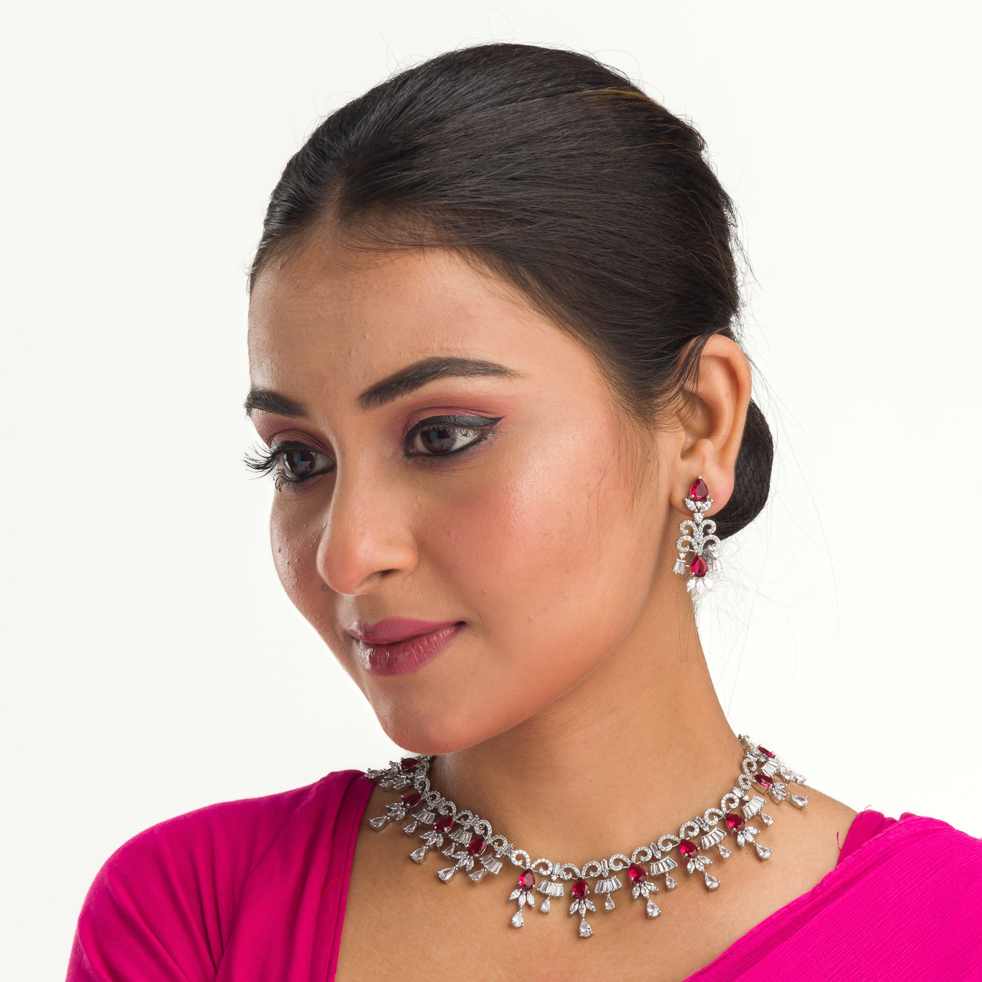 "Red and silver zircon necklace combines sleek silver polish with sophisticated elegance."
