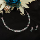 "Vibrant pink and green zircon necklace offers an eye-catching, colorful design."
