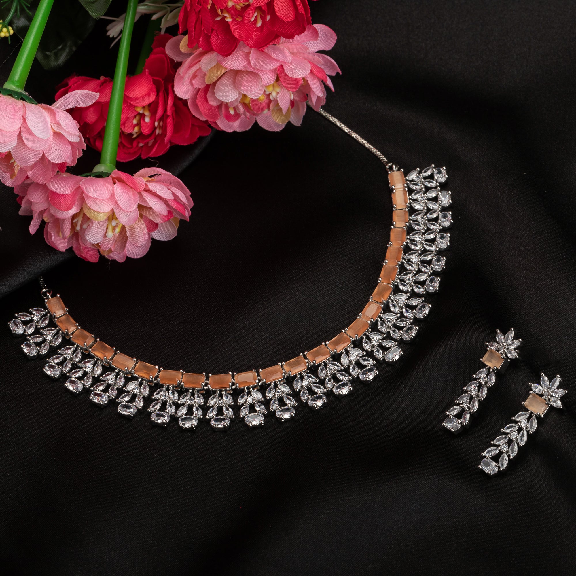 "Radiant orange zircon necklace delivers a bold, vibrant statement."
