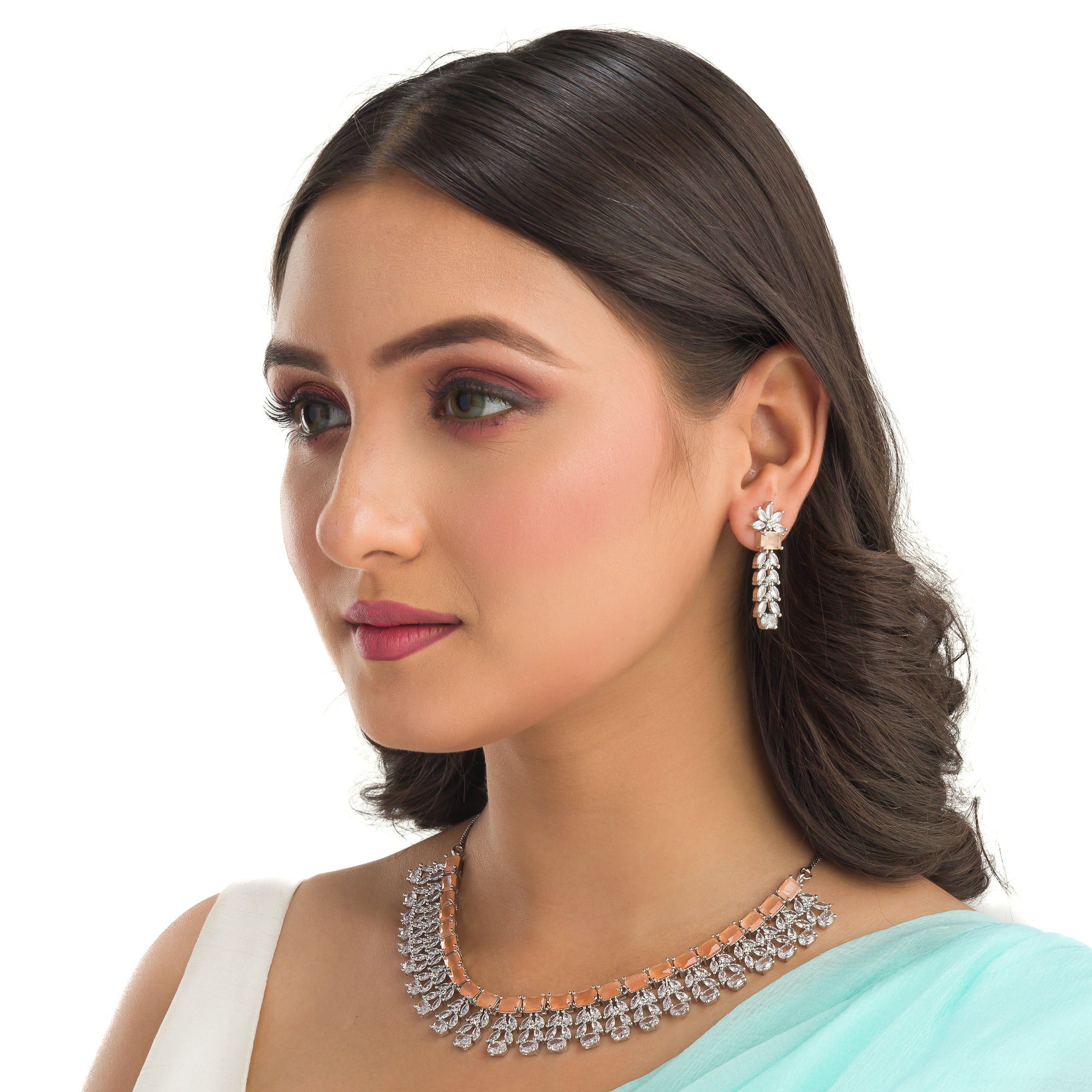 "Radiant orange zircon necklace delivers a bold, vibrant statement."

