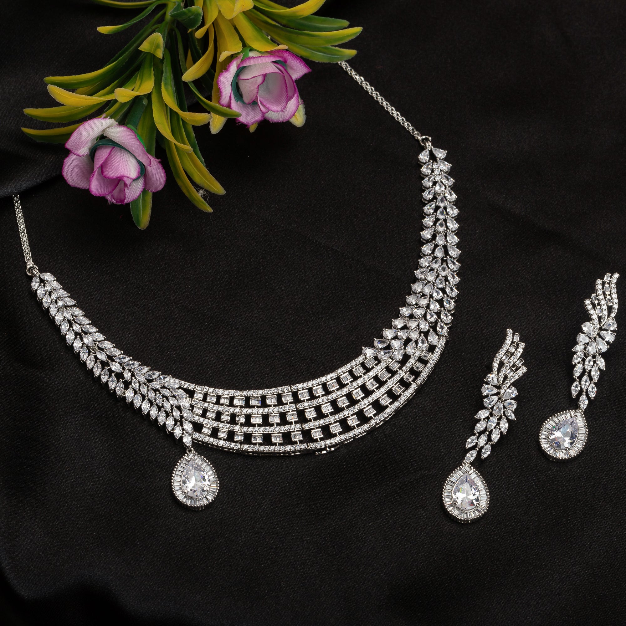 1. "Zircon necklace with a large drop stone adds dramatic sparkle to any look."

